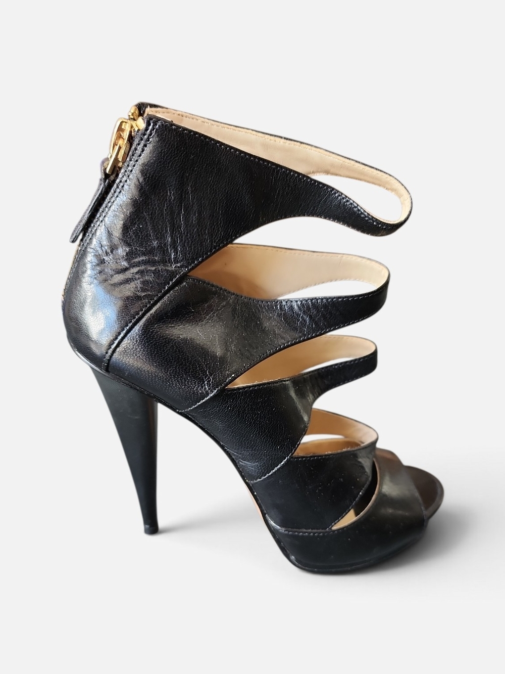 Nine West Strappy High Heels Women 6M Black Leather Rear Zip
Strappy Stiletto